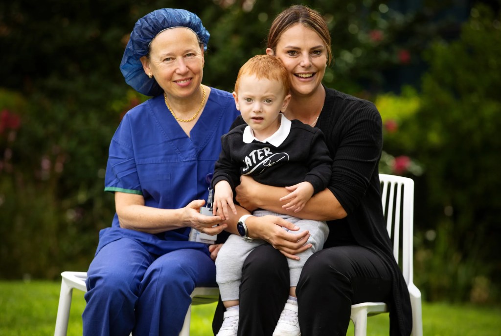 Rch clinician Susan with patient jordan and mum